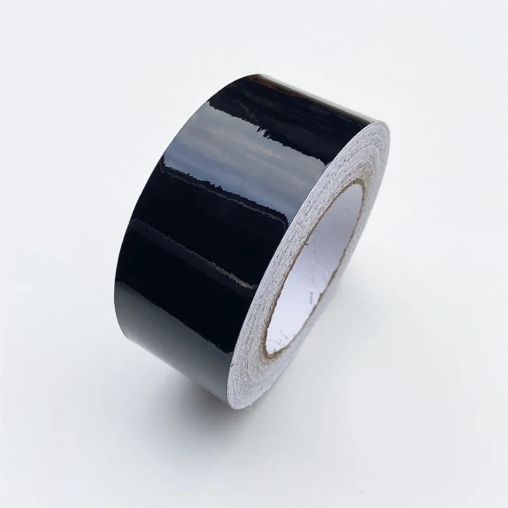 Glossy black chrome delete vinyl tape roll, view 7